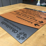 Graphic Components, wholesale ADA manufacturing, wholesale braille signs, raster braille, Directory Sign